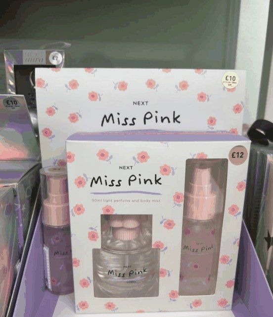 Pink perfume gift set in an open box
